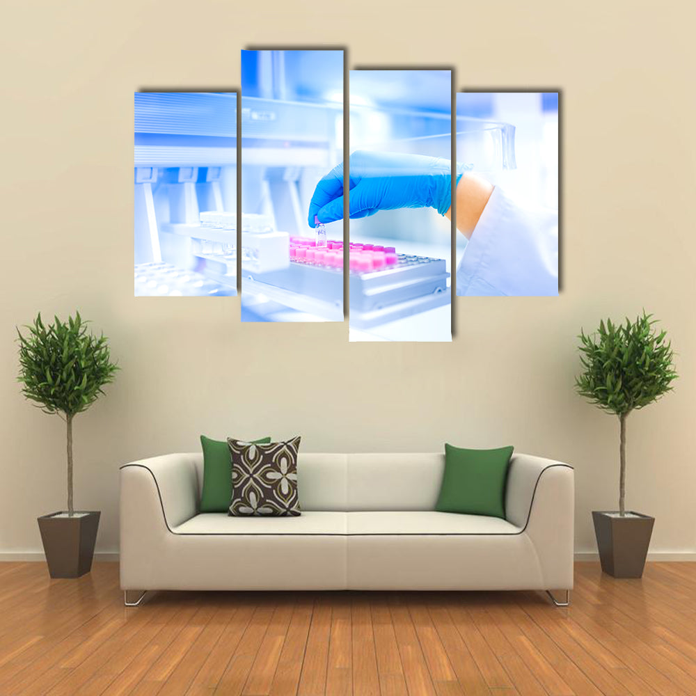 Hand Holding Vial in Medical Laboratory Canvas Wall Art