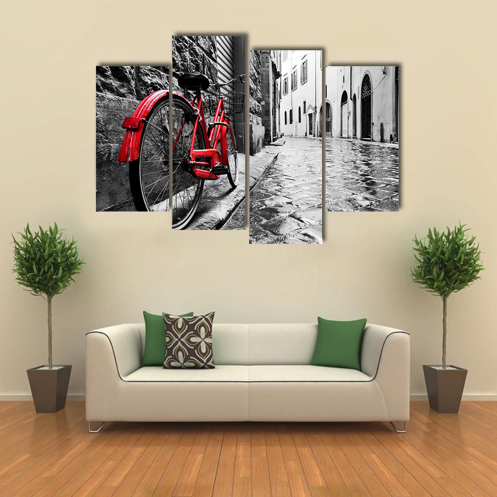 Red Bicycle on Cobblestone Street Canvas Wall Art
