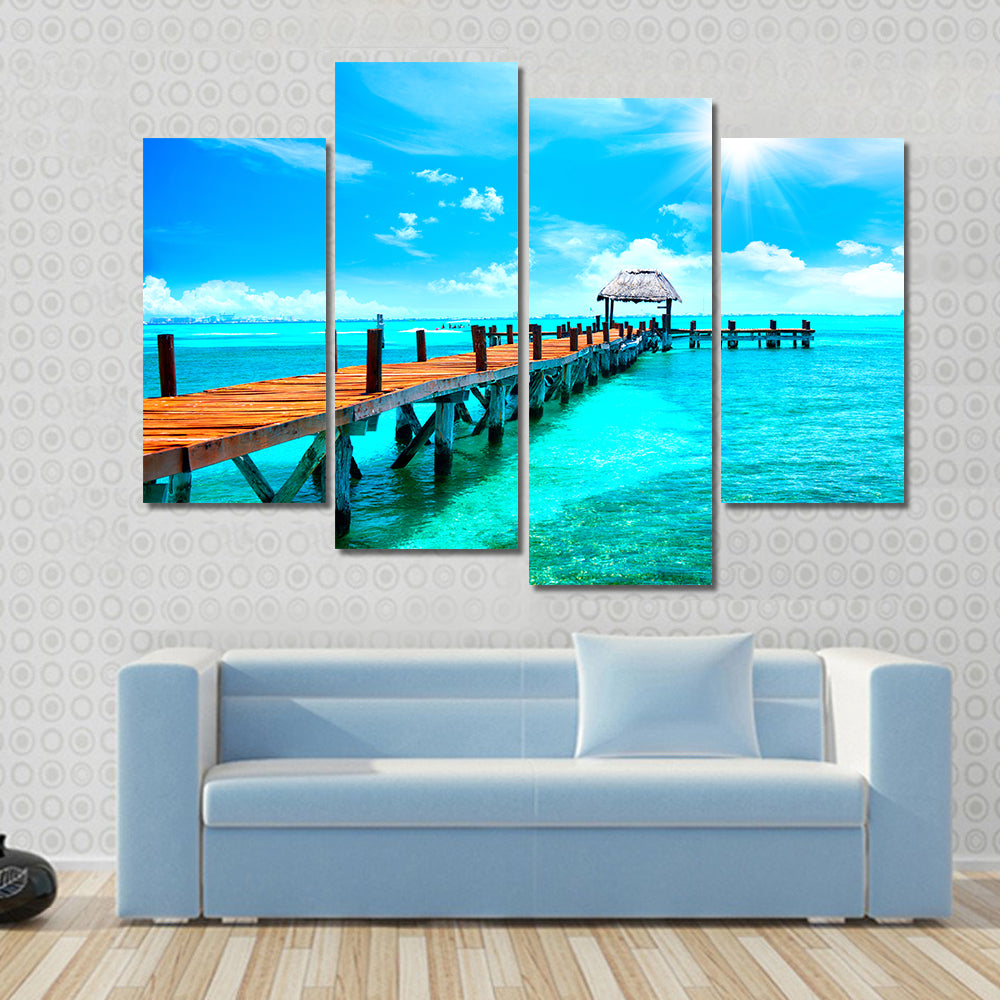 Sunlit Wooden Pier and Thatched Hut Canvas Wall Art