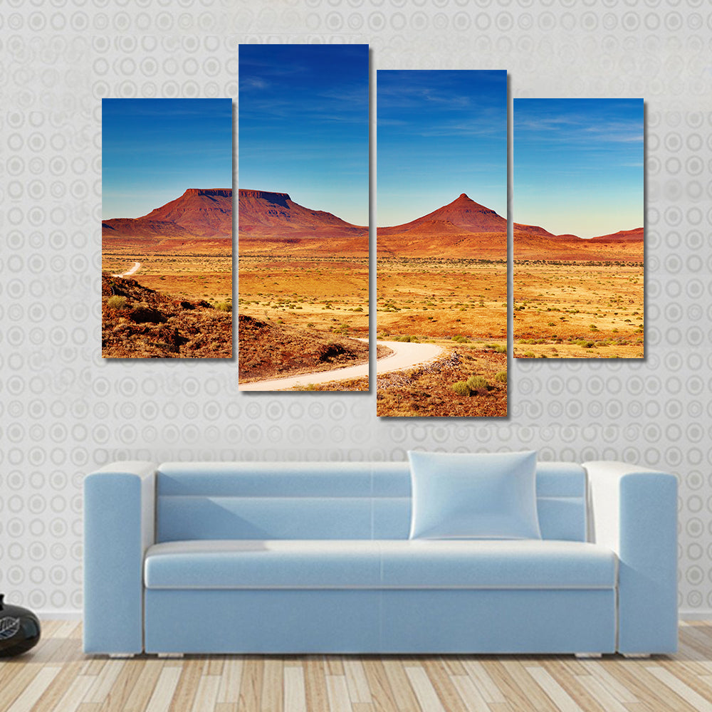 Winding Desert Road to Distant Peaks Canvas Wall Art