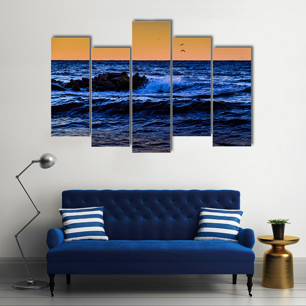 Blue Ocean Waves at Sunset Canvas Wall Art