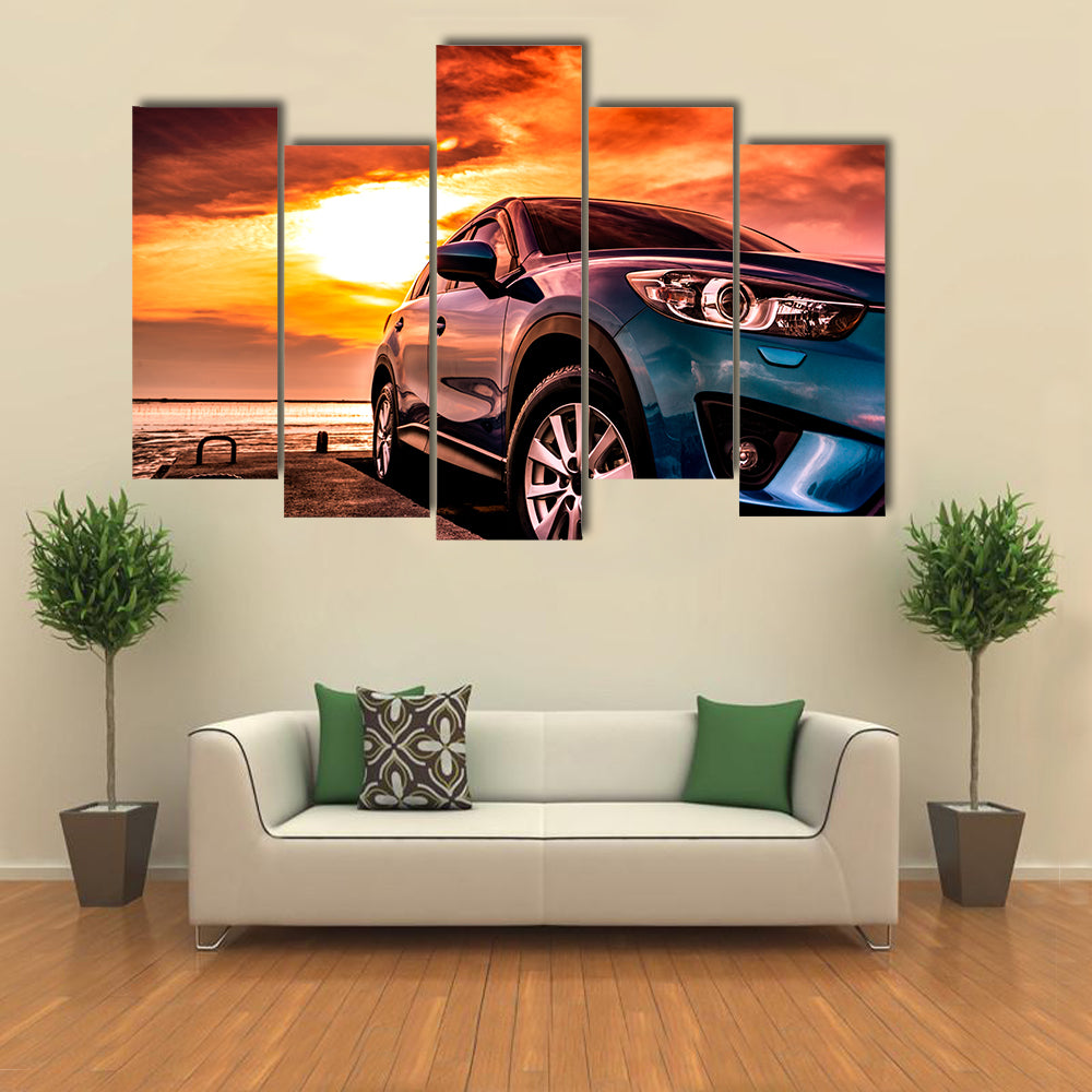 Blue Suv at Coastal Sunset Canvas Wall Art