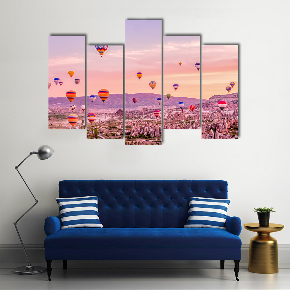 Hot Air balloons Flying Over Rock Landscape At Cappadocia Canvas Wall Art