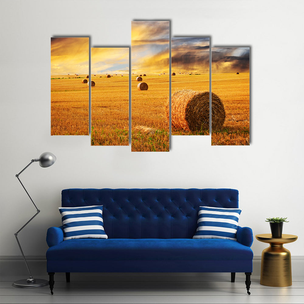 Golden Sunset Over Farm Field With Hay Bales Canvas Wall Art