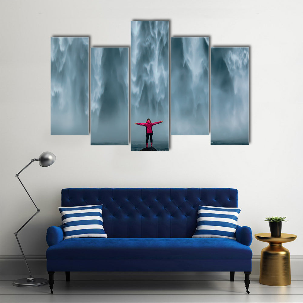 Girl Against Skogafoss Waterfall At South Iceland Canvas Wall Art