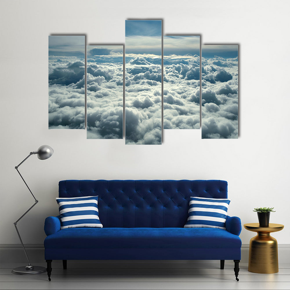 Clouds In Morning From Airplane Canvas Wall Art