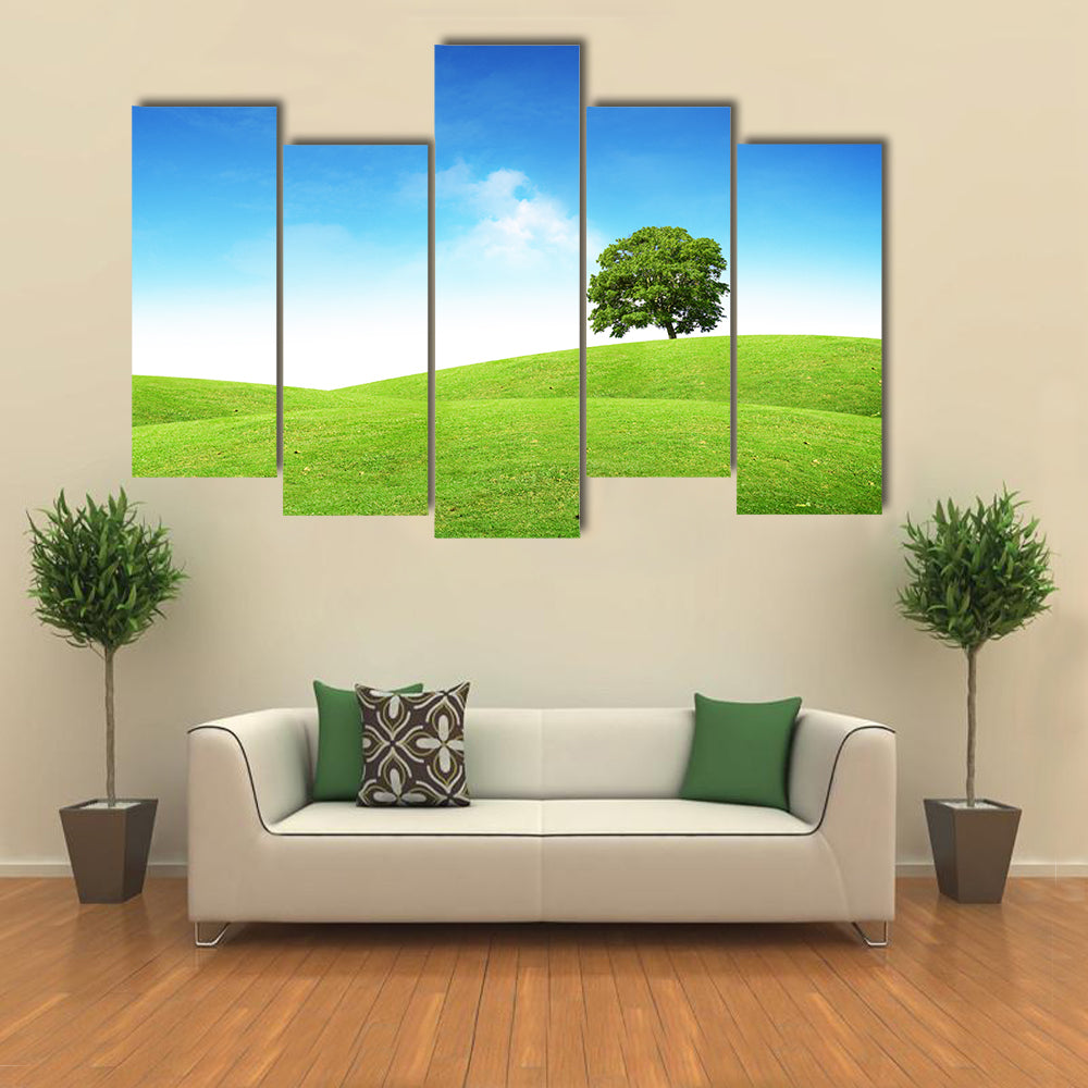 Lone Tree on Rolling Green Hills Canvas Wall Art