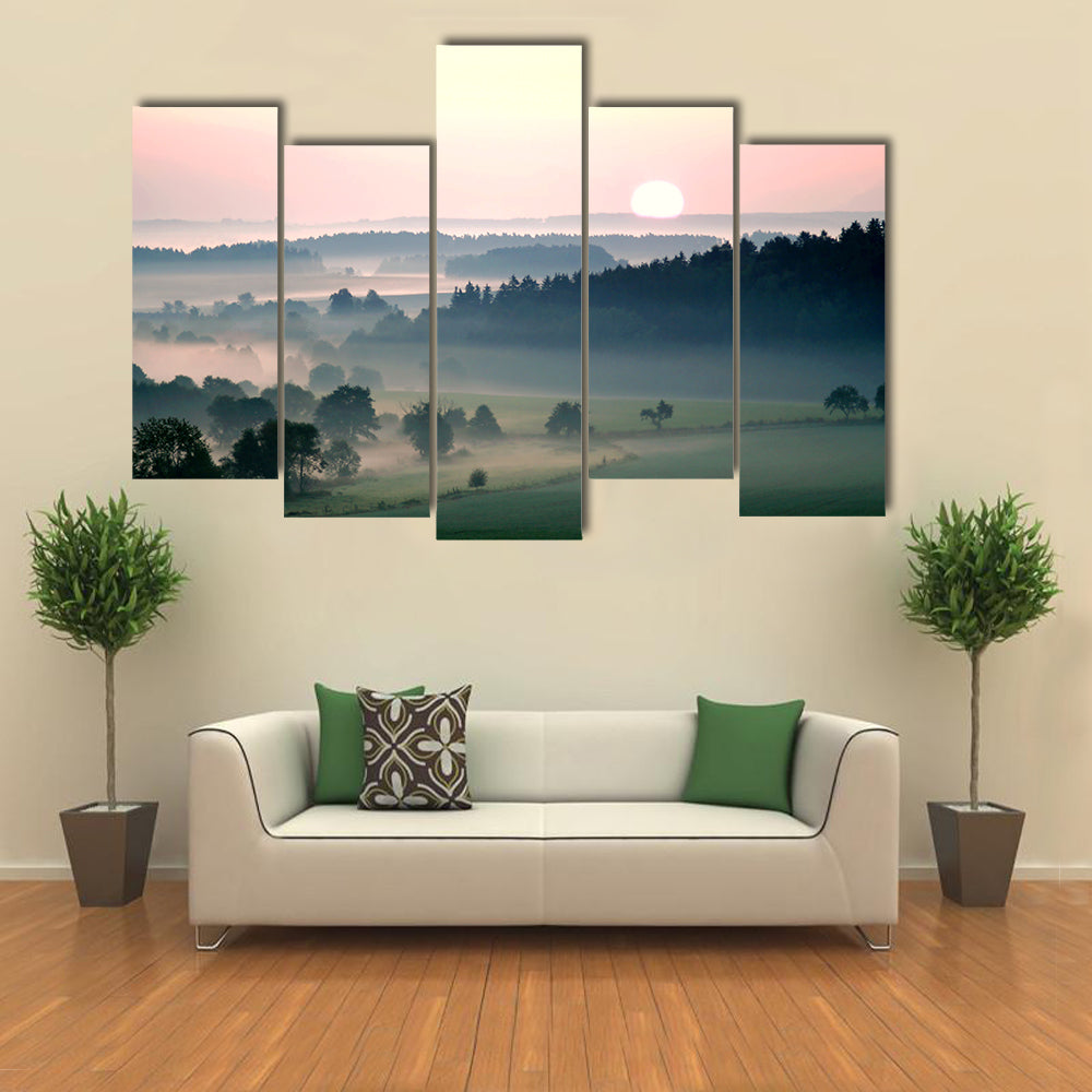 Misty Sunrise Over Layered Hills Canvas Wall Art