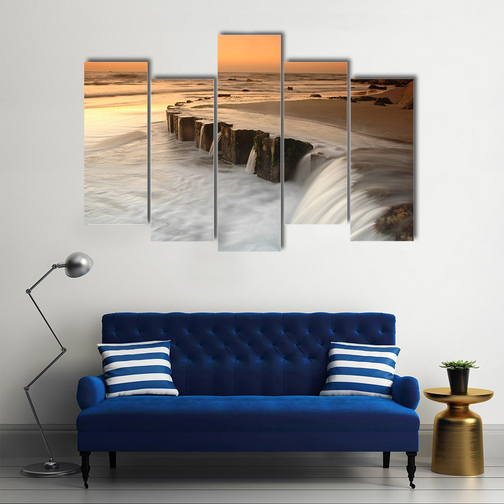 Waterfall By The Sea At Sunset Canvas Wall Art