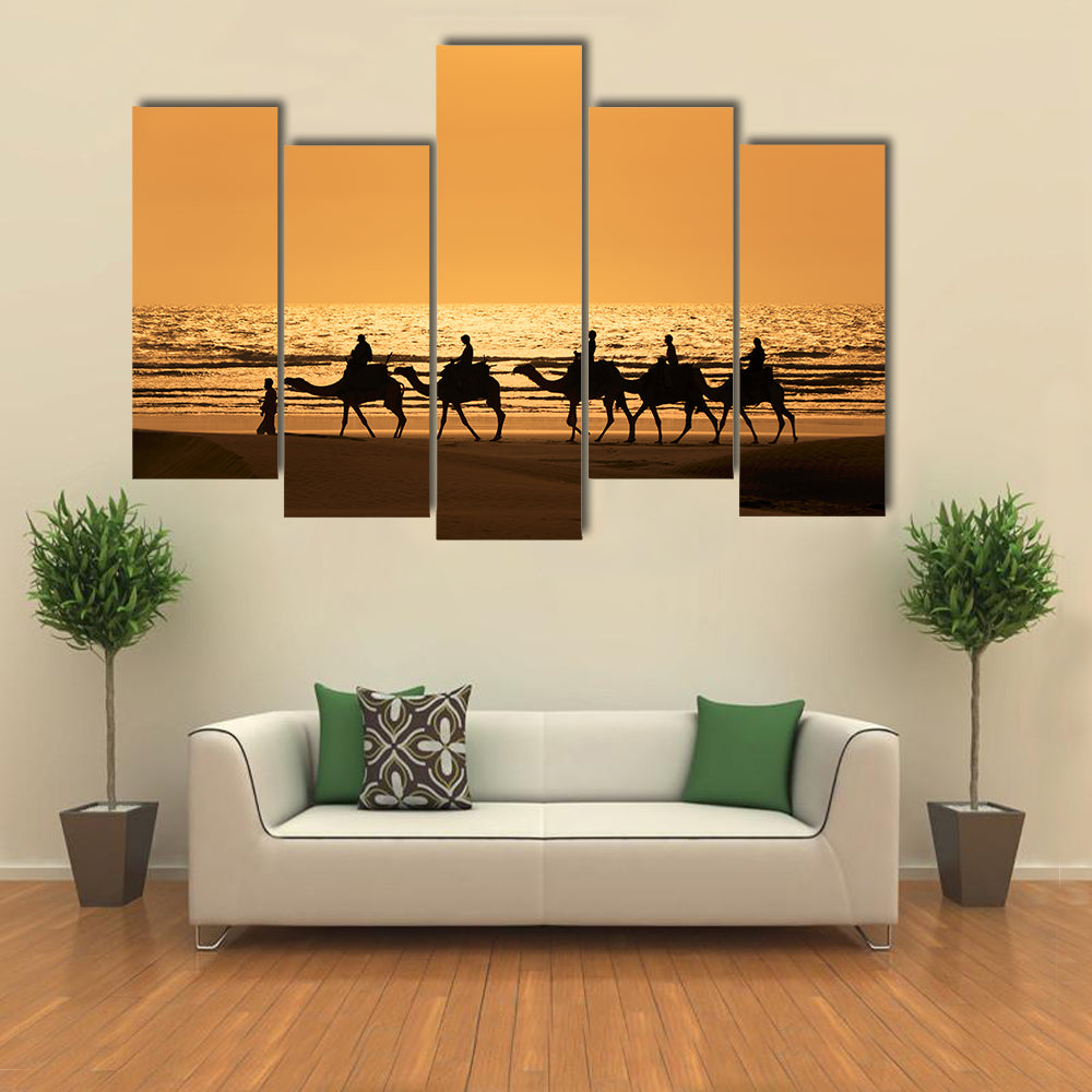 Silhouette Of Dromedary And Tourists At Sunset Morocco Canvas Wall Art