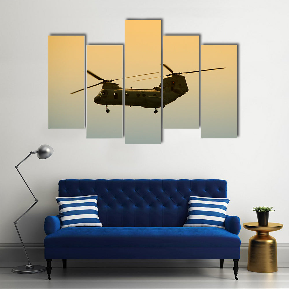 Military Cargo Helicopter In Flight At Dawn Canvas Wall Art