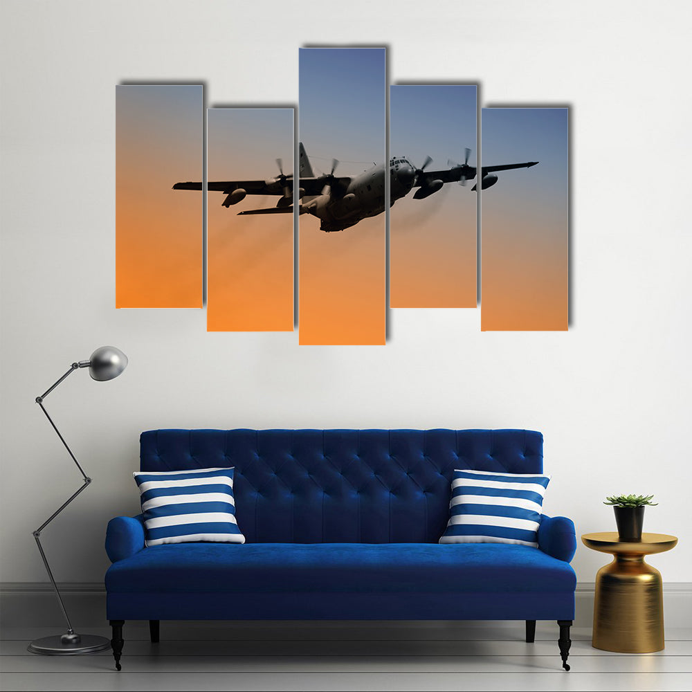 Military Airplane Flying Into Early Morning Sky Canvas Wall Art