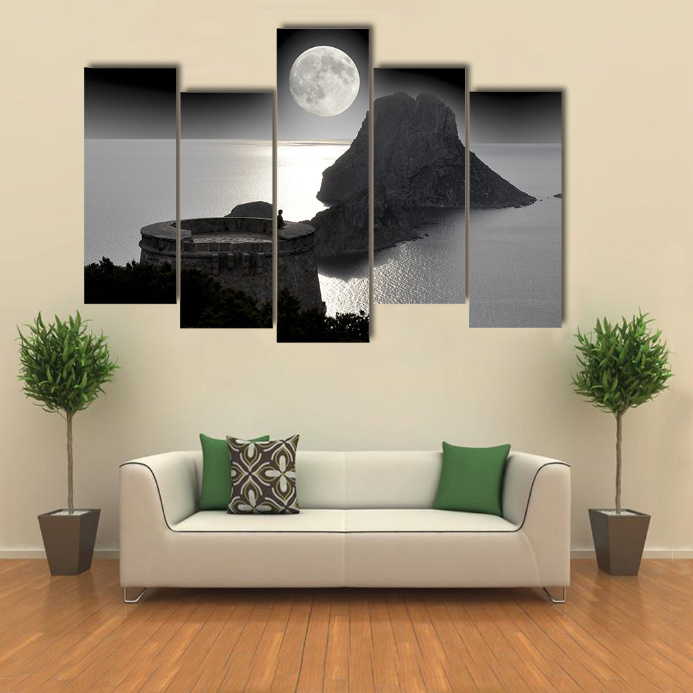 Moonlit Watchtower on Rocky Island Canvas Wall Art