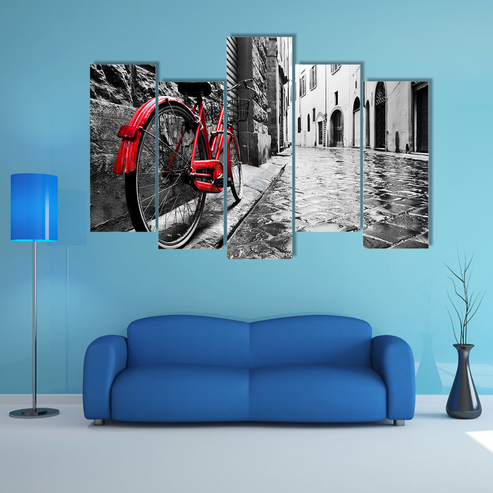 Red Bicycle on Cobblestone Street Canvas Wall Art