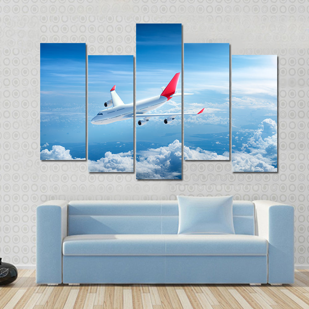 Four-engine Jet Above Clouds Canvas Wall Art