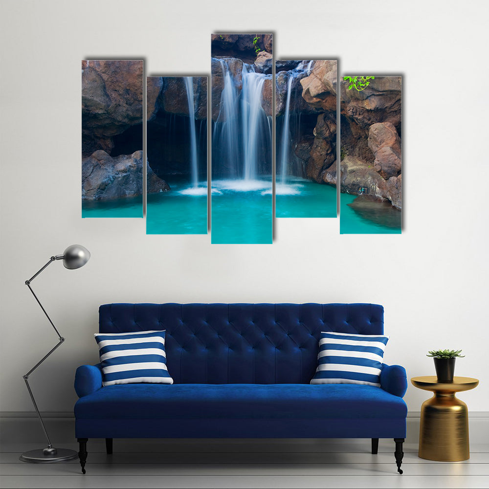 Waterfall Into Hotel Pool In Hawaii Canvas Wall Art