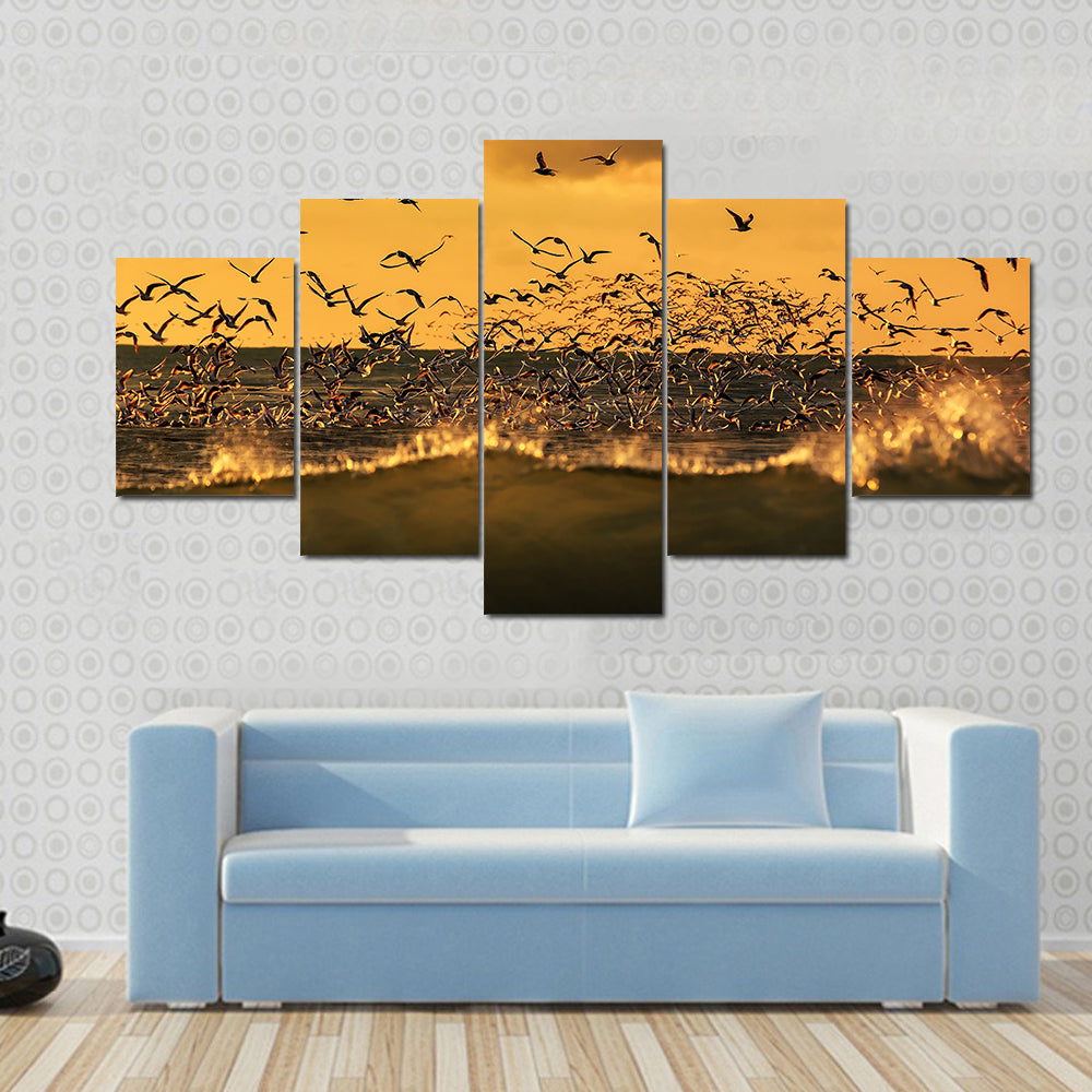 Seagulls Hovering Over Stormy Sea Canvas Wall Art
