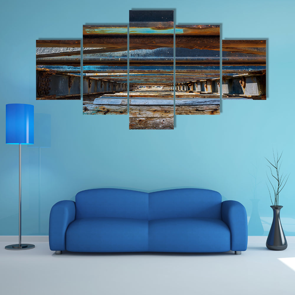 Under Pier Rusted Beams and Weathered Wood Canvas Wall Art