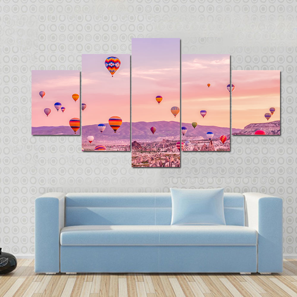 Hot Air balloons Flying Over Rock Landscape At Cappadocia Canvas Wall Art