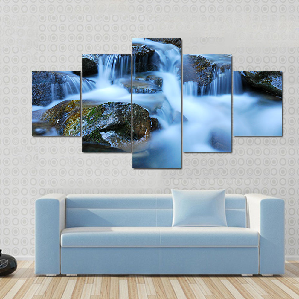 River Through Mossy Stones in Cadore Canvas Wall Art