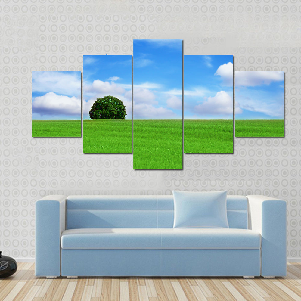 Lone Tree in Vibrant Green Field Canvas Wall Art