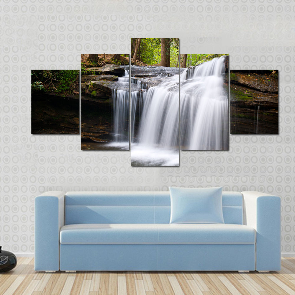 Cascading Forest Waterfall Over Layered Rocks Canvas Wall Art