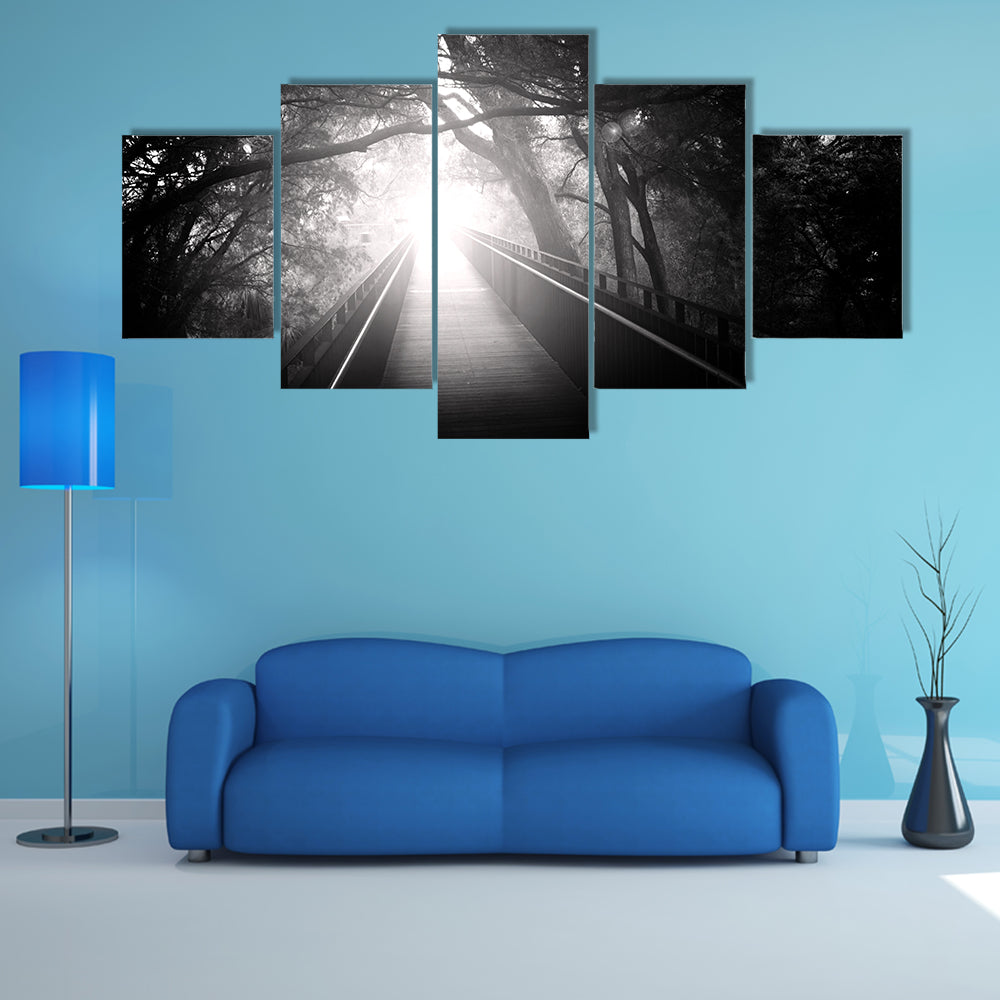 Bridge In Forest With Sun Rays Canvas Wall Art