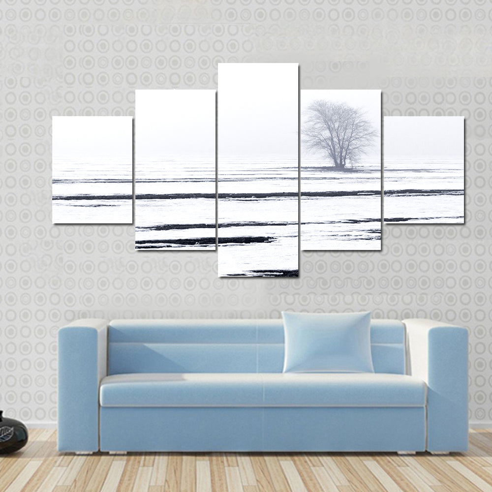 Solitary Tree in Snowy Field Canvas Wall Art