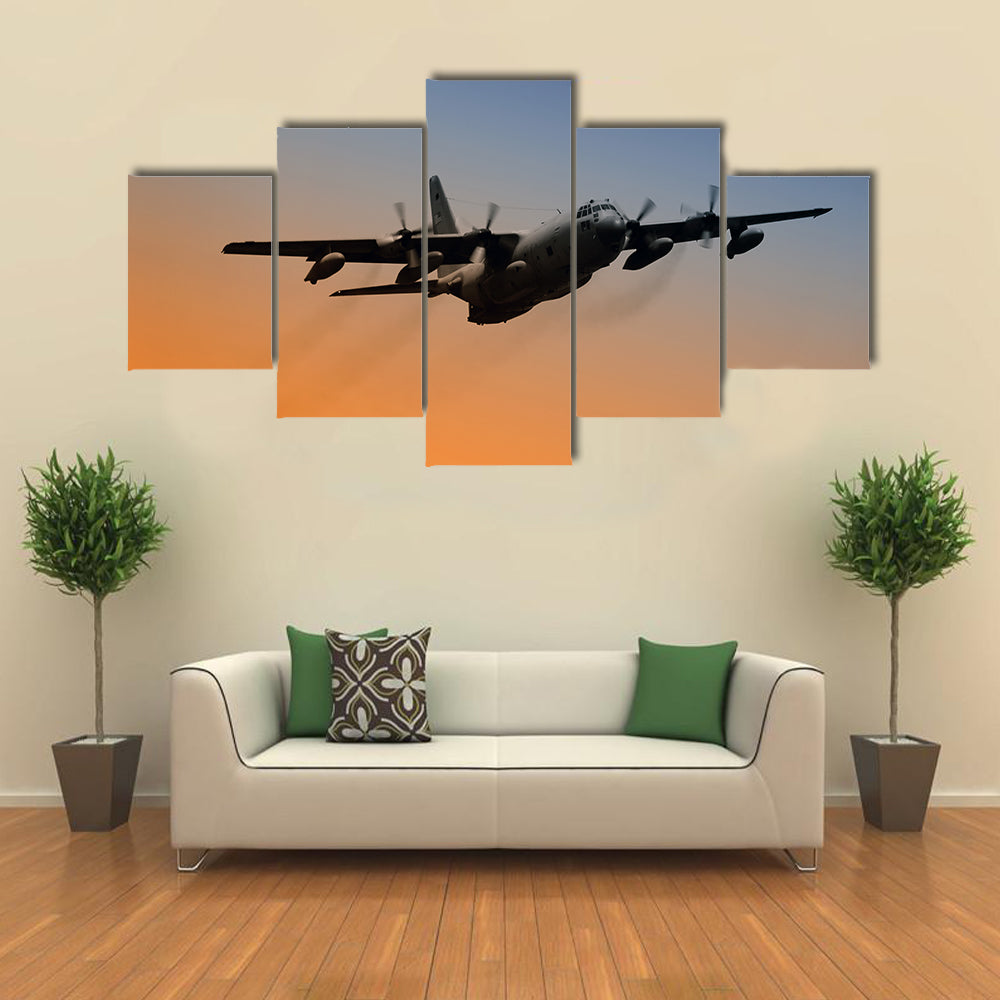 Military Airplane Flying Into Early Morning Sky Canvas Wall Art