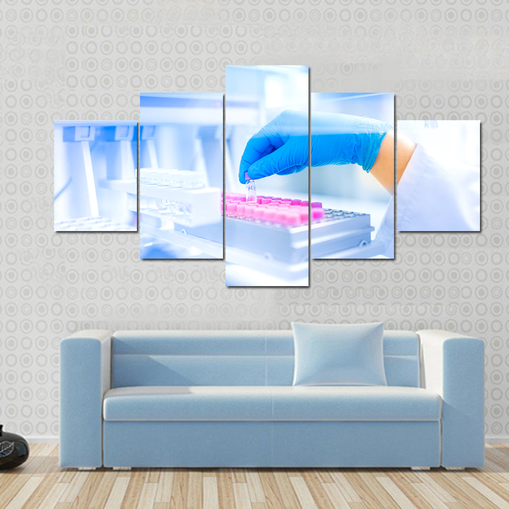 Hand Holding Vial in Medical Laboratory Canvas Wall Art