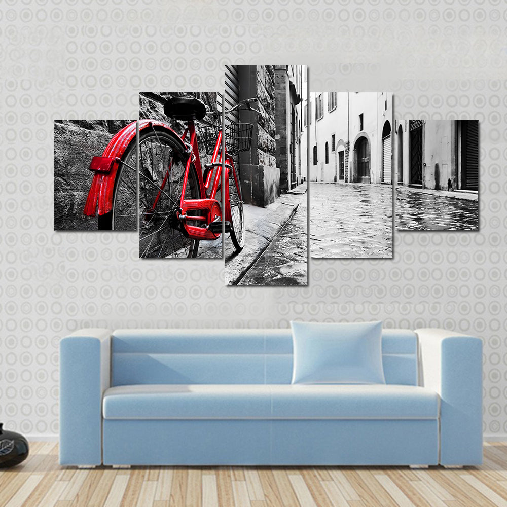 Red Bicycle on Cobblestone Street Canvas Wall Art