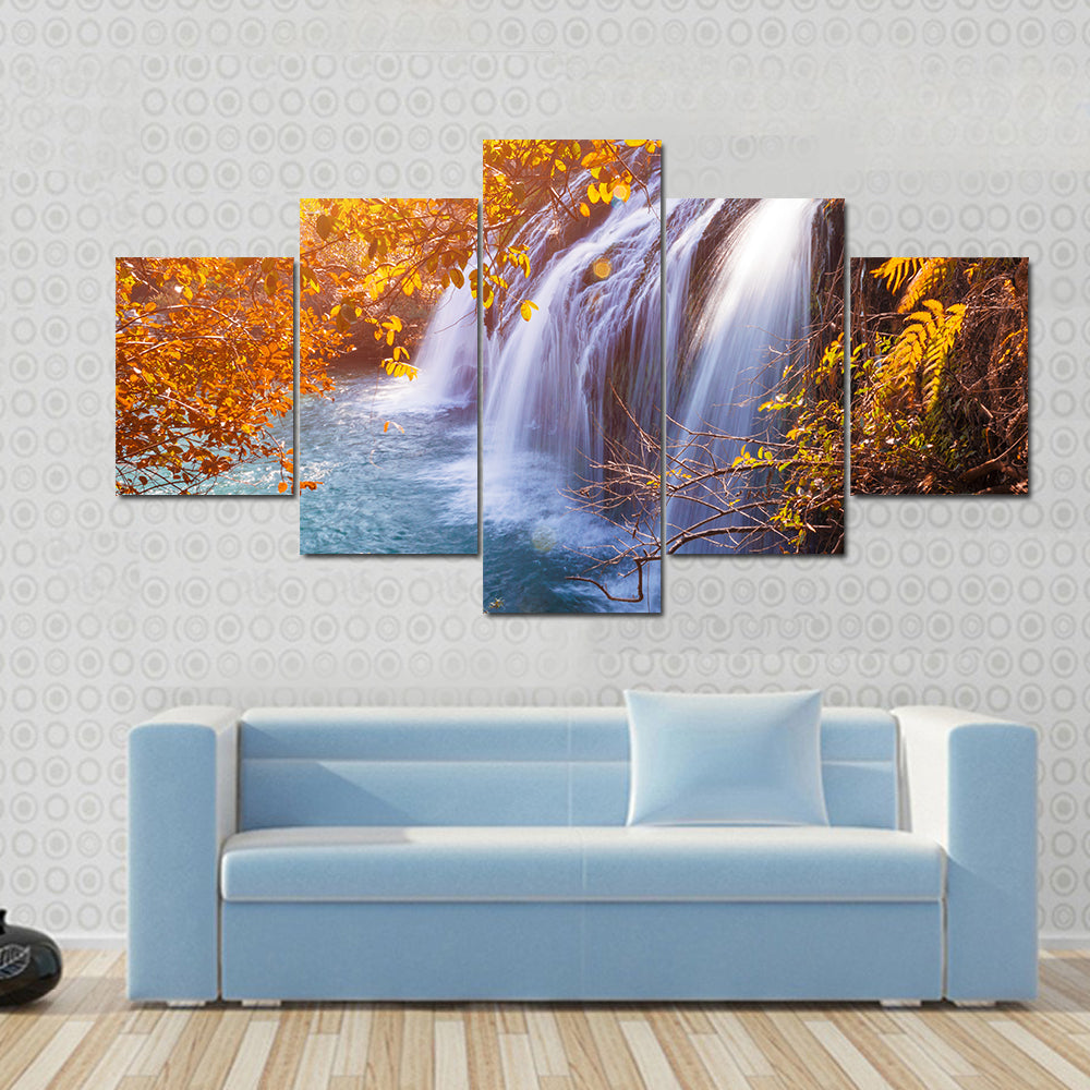 Autumn Waterfall with Sunlit Foliage Canvas Wall Art
