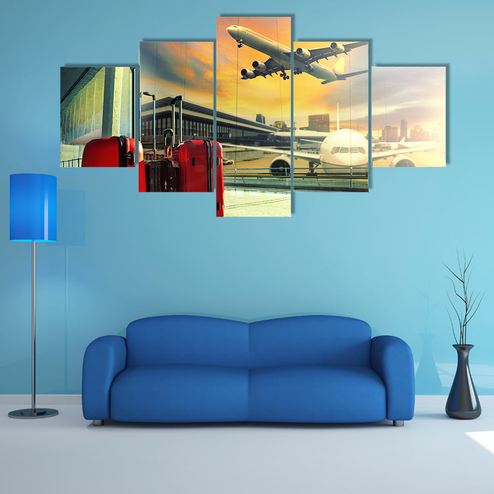 Red Suitcases and Plane at Sunset Canvas Wall Art