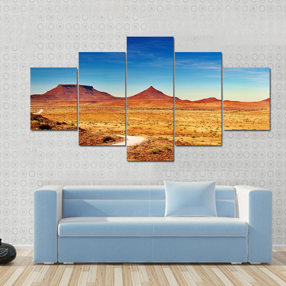 Winding Desert Road to Distant Peaks Canvas Wall Art