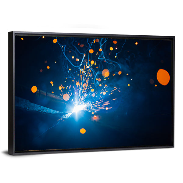 Welding Arc with Blue Smoke and Sparks Canvas Wall Art in black, orange and blue, framed canvas, product view on a white background