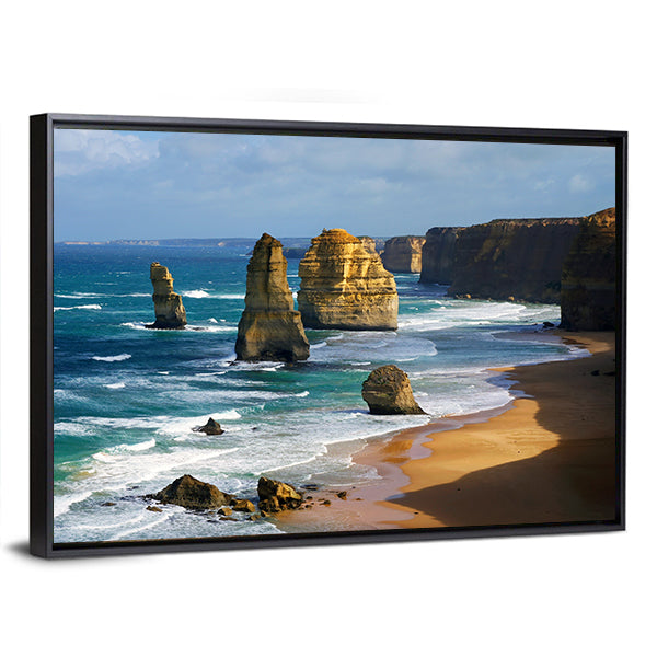 Limestone Stacks on Turquoise Shore Canvas Wall Art in beige, brown and blue, framed canvas, product view on a white background