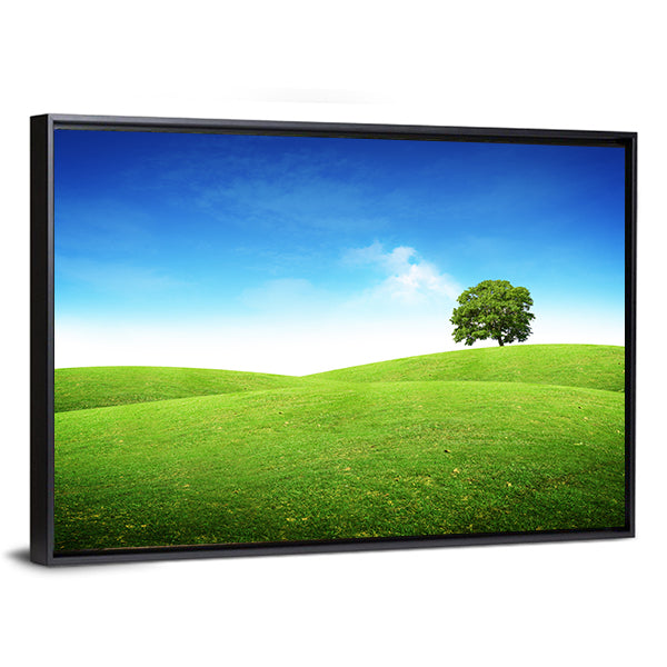 Lone Tree on Rolling Green Hills Canvas Wall Art in green and blue, framed canvas, product view on a white background