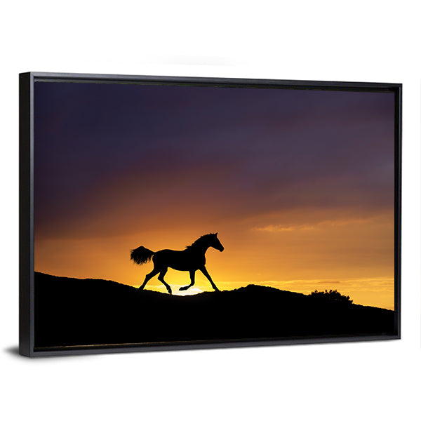 Galloping Horse Silhouette at Sunset Canvas Wall Art in black, orange and purple, framed canvas, product view on a white background