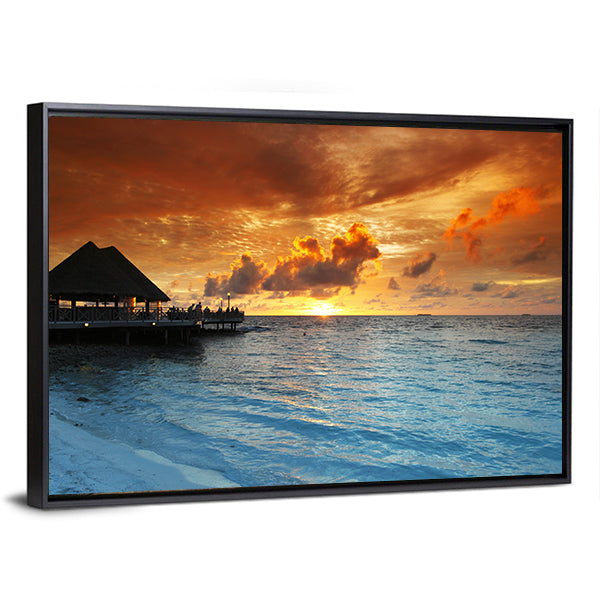 Maldives Thatched Hut on Pier at Sunset Canvas Wall Art