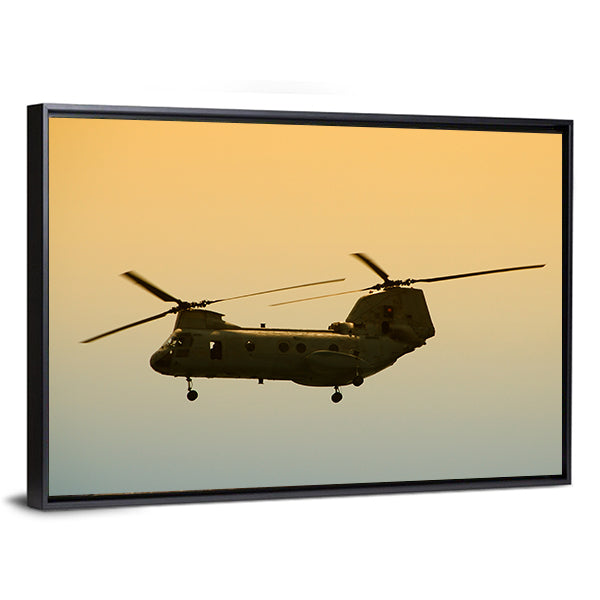 Military Cargo Helicopter In Flight At Dawn Canvas Wall Art
