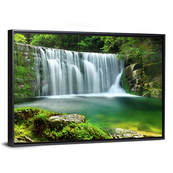 Emerald Lake Forest Waterfall Canvas Wall Art in white and green, framed canvas, product view on a white background