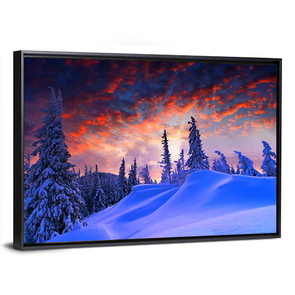 Winter Sunset Over Snow-covered Pines Canvas Wall Art in white, orange and blue, framed canvas, product view on a white background