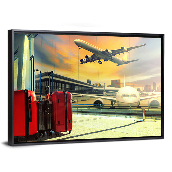 Red Suitcases and Plane at Sunset Canvas Wall Art
