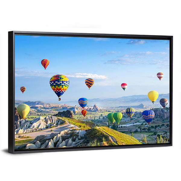 Hot Air Balloons Over Cappadocia Canvas Wall Art in blue and multicolor, framed canvas, product view on a white background