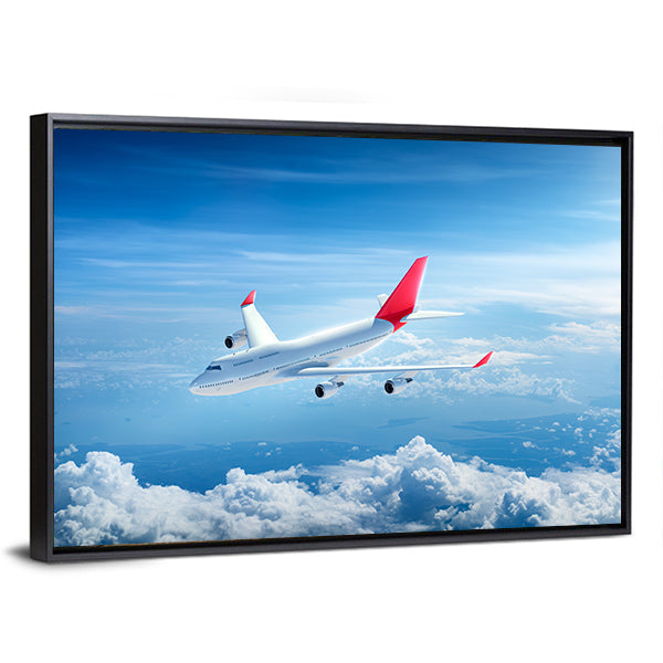 Airplane Flying Above Clouds Canvas Wall Art