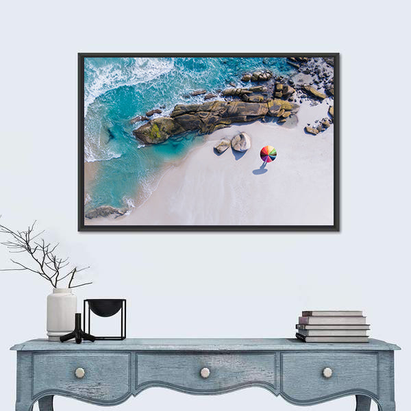 Umbrella On The Beach And Foam Of Sea Wave Canvas Wall Art