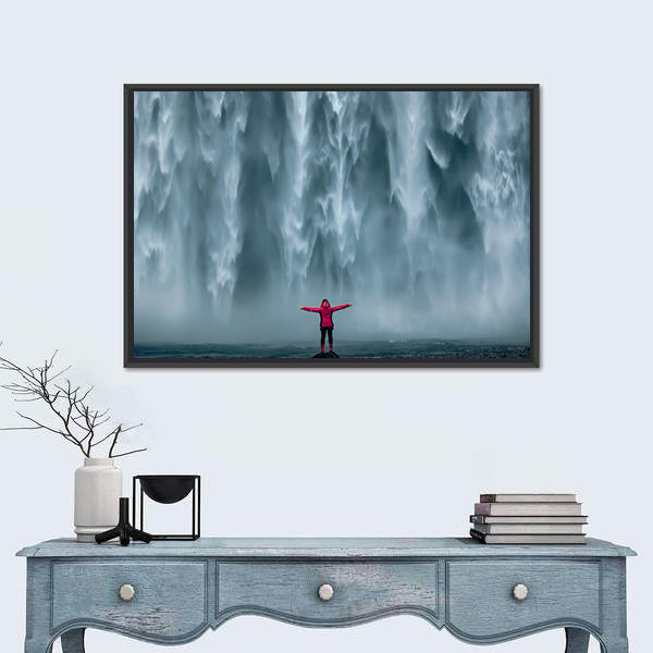 Girl Against Skogafoss Waterfall At South Iceland Canvas Wall Art
