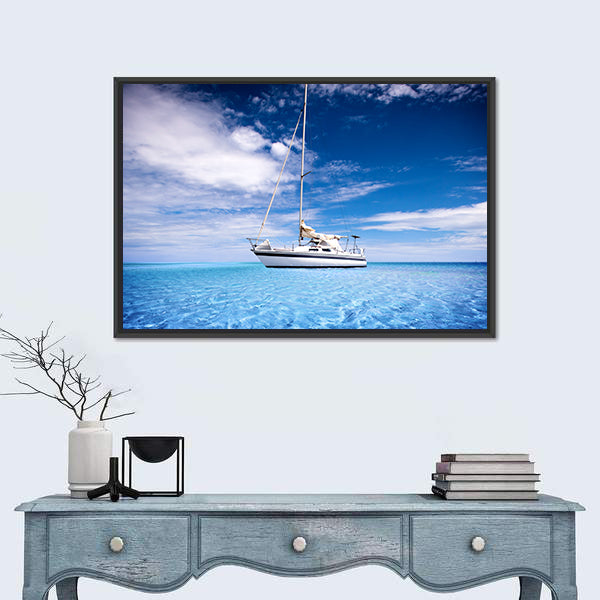 Single-masted White Sailboat on Turquoise Water Canvas Wall Art