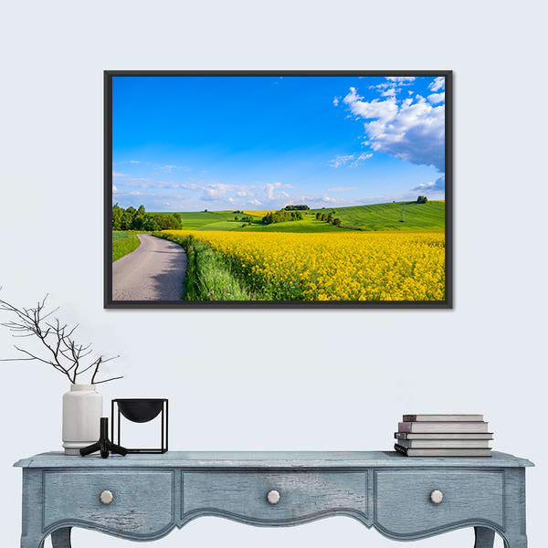 Oilseed field In Italian Countryside Canvas Wall Art