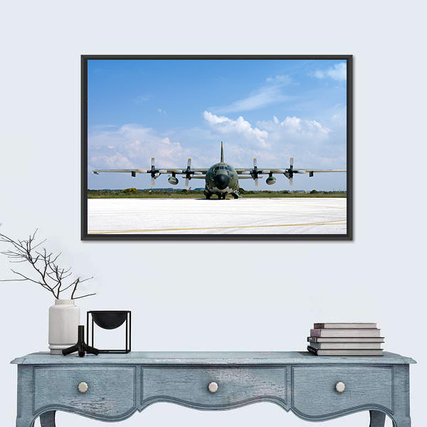 Military Airplane Parked At An Airbase Canvas Wall Art